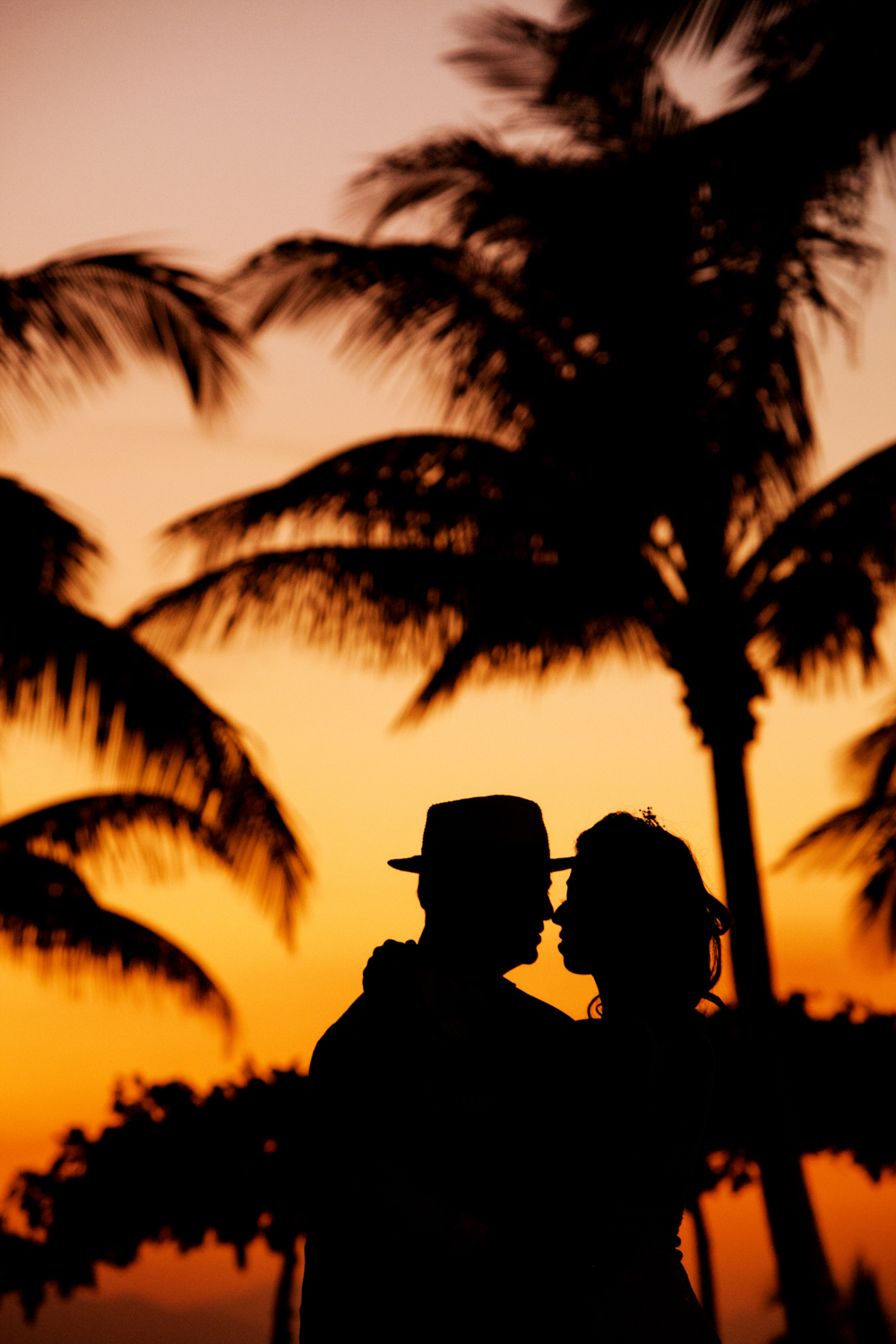 Couple in beach on sunset