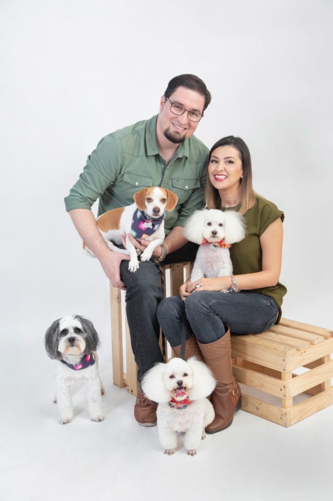 couple with 2 dogs on studio